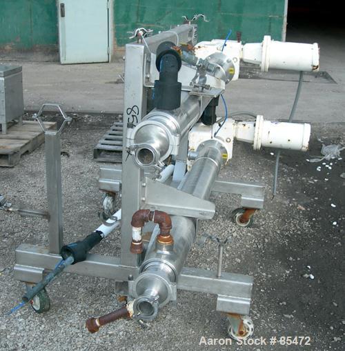 USED: Cherry Burrell dual chamber votator scraped surface heat exchanger, 9 square feet, model 4SSHE, 316 stainless steel. (2) 4" diameter x 60" long jacketed horizontal chambers rated internal 200 p...