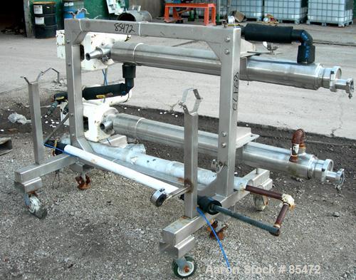 USED: Cherry Burrell dual chamber votator scraped surface heat exchanger, 9 square feet, model 4SSHE, 316 stainless steel. (2) 4" diameter x 60" long jacketed horizontal chambers rated internal 200 p...