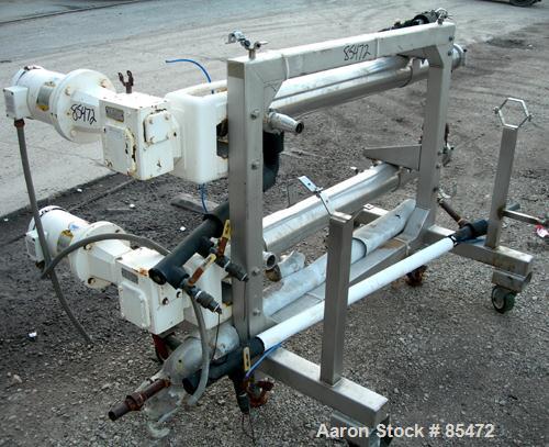 USED: Cherry Burrell dual chamber votator scraped surface heat exchanger, 9 square feet, model 4SSHE, 316 stainless steel. (2) 4" diameter x 60" long jacketed horizontal chambers rated internal 200 p...