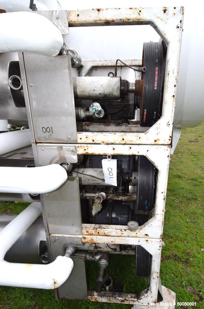 Used Cherry-Burrell Triple Tube Thermutator, 27 Total Square Feet, Stainless Steel. Consists of: (3) model 672 Thermutators, approximate 6" diameter x 72" long jacketed tubes, each 9 square feet heat...