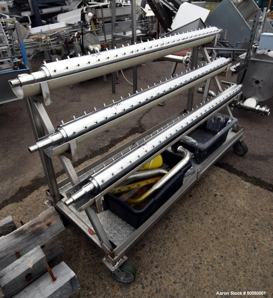Used Cherry-Burrell Triple Tube Thermutator, 27 Total Square Feet, Stainless Steel. Consists of: (3) model 672 Thermutators, approximate 6" diameter x 72" long jacketed tubes, each 9 square feet heat...