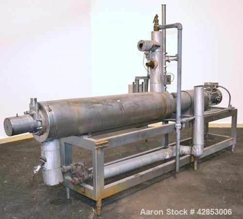 Used Waukesha Cherry Burrell Votator Scraped Surface Heat Exchanger, 9 Square Feet, Model 6SSHE, 316 stainless steel. (1) 6" Diameter x 72" long jacketed horizontal chamber with stainless steel blade...