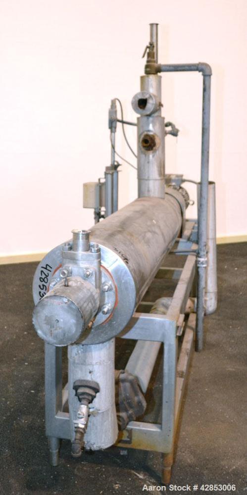 Used Waukesha Cherry Burrell Votator Scraped Surface Heat Exchanger, 9 Square Feet, Model 6SSHE, 316 stainless steel. (1) 6" Diameter x 72" long jacketed horizontal chamber with stainless steel blade...