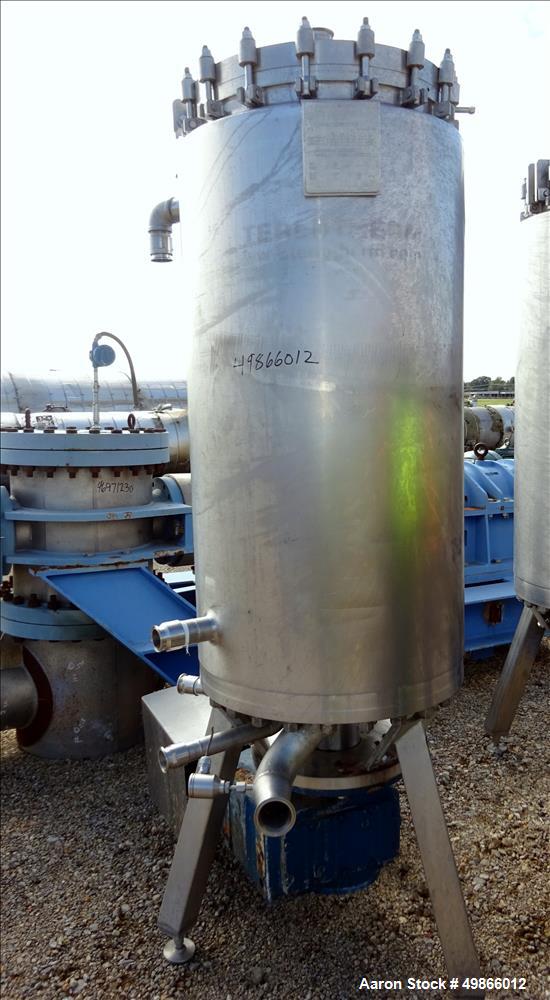 Used Terlet Terlotherm Scraped Surface Heat Exchanger, Stainless Steel. Approximate 29" diameter x 54" straight side. Openings top: 3", bottom: 2". Serial # 0311040-001-001. Built 2003.