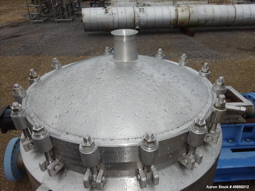 Used Terlet Terlotherm Scraped Surface Heat Exchanger, Stainless Steel. Approximate 29" diameter x 54" straight side. Openings top: 3", bottom: 2". Serial # 0311040-001-001. Built 2003.