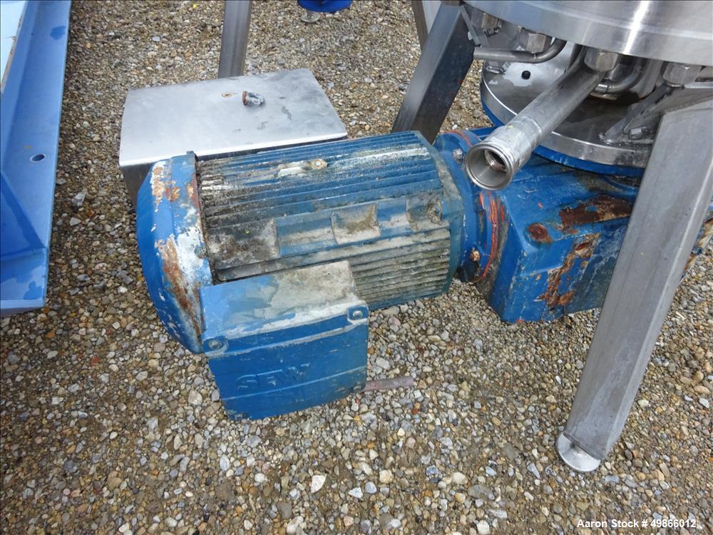 Used Terlet Terlotherm Scraped Surface Heat Exchanger, Stainless Steel. Approximate 29" diameter x 54" straight side. Openings top: 3", bottom: 2". Serial # 0311040-001-001. Built 2003.
