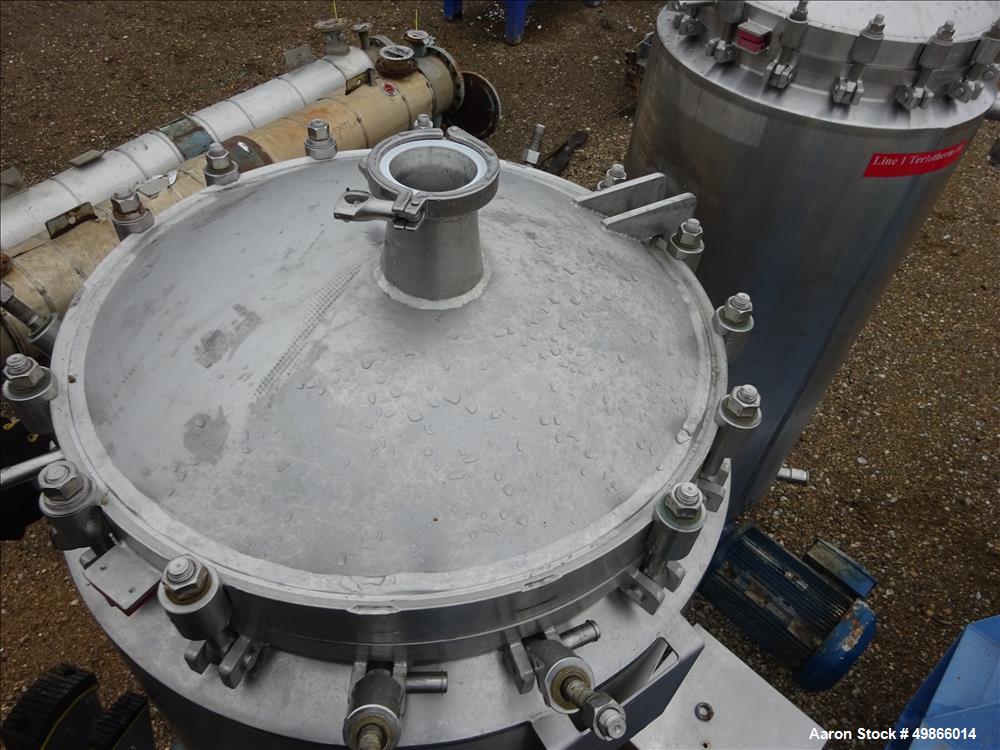 Used Terlet Terlotherm Scraped Surface Heat Exchanger, Stainless Steel. Approximate 29" diameter x 54" straight side. Openings top: 3", bottom: 2". Serial # 0910571-001-001. Built 2009.