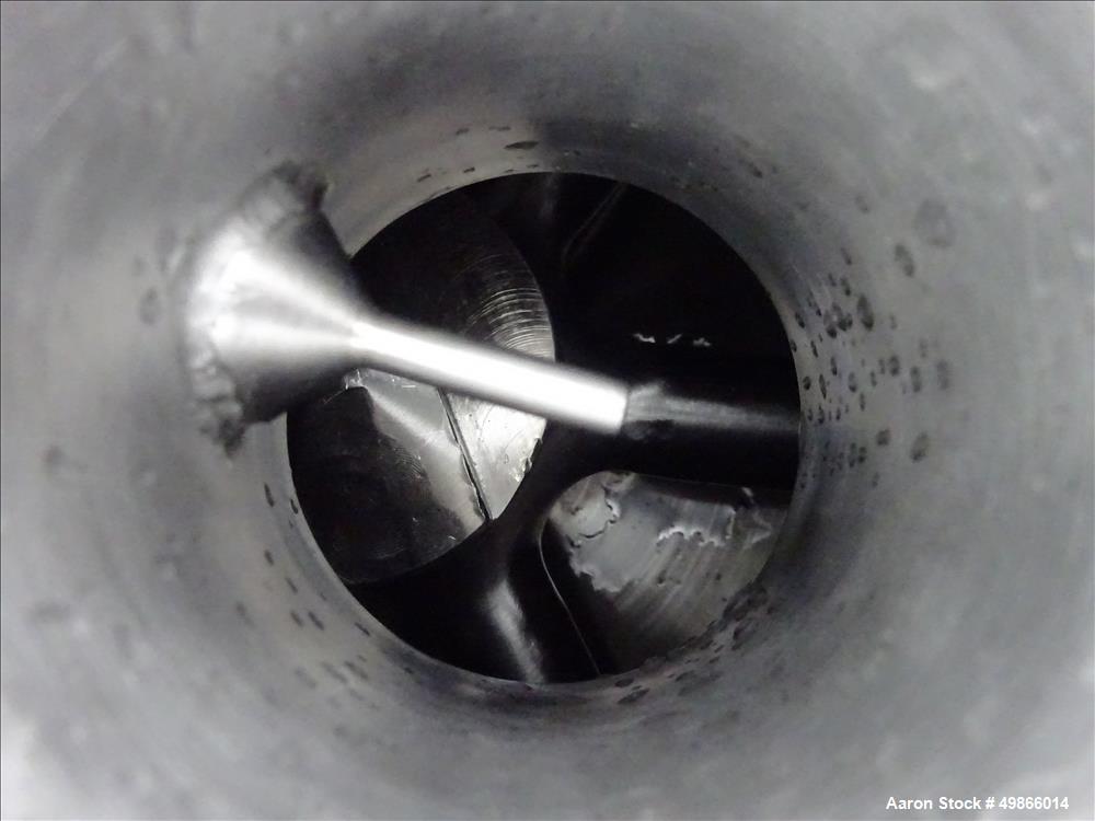 Used Terlet Terlotherm Scraped Surface Heat Exchanger, Stainless Steel. Approximate 29" diameter x 54" straight side. Openings top: 3", bottom: 2". Serial # 0910571-001-001. Built 2009.