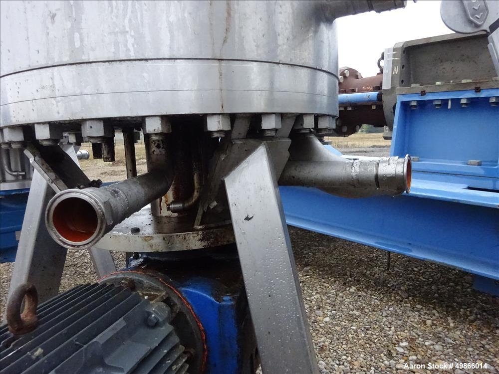 Used Terlet Terlotherm Scraped Surface Heat Exchanger, Stainless Steel. Approximate 29" diameter x 54" straight side. Openings top: 3", bottom: 2". Serial # 0910571-001-001. Built 2009.