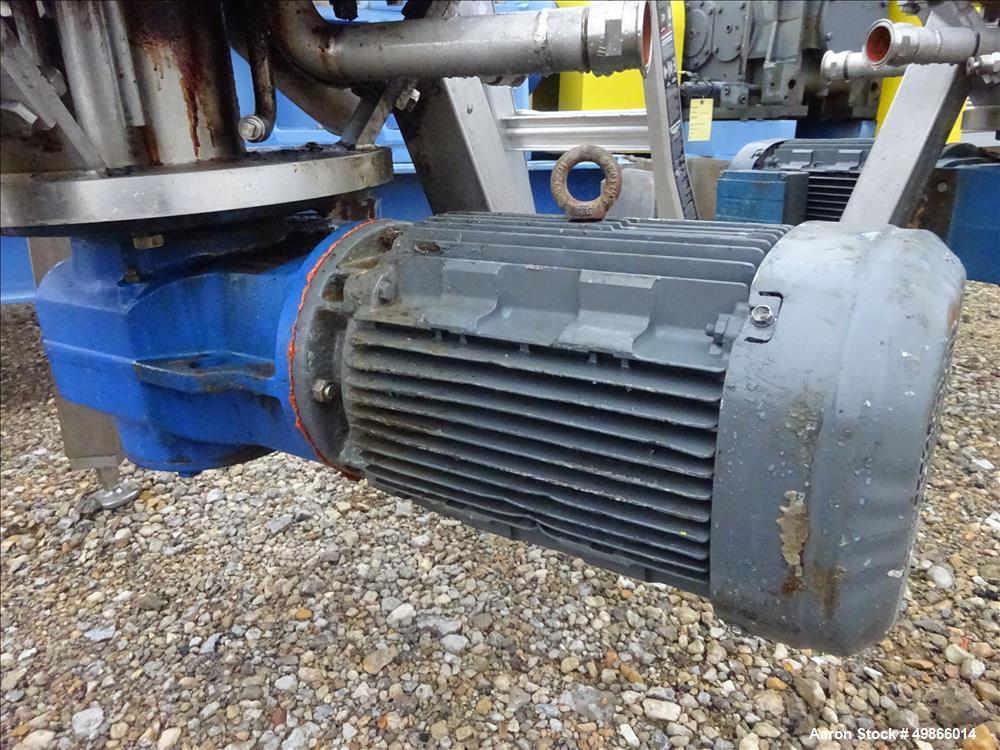 Used Terlet Terlotherm Scraped Surface Heat Exchanger, Stainless Steel. Approximate 29" diameter x 54" straight side. Openings top: 3", bottom: 2". Serial # 0910571-001-001. Built 2009.