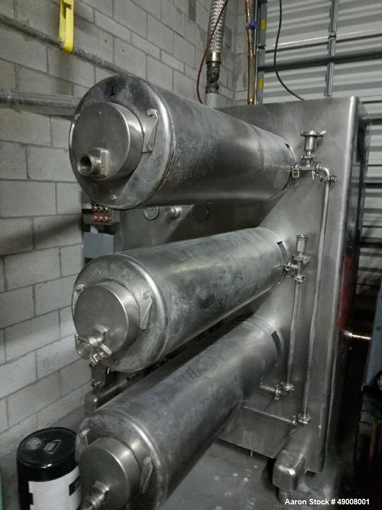 Used Cherry Burrell - Converted to Freon, each cylinder runs 300 gallons per hou