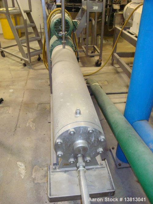 Used 7.5 hp Votator mixer. 1" inlet and outlet. 10' overall length.