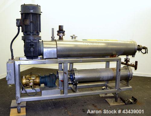 Used Cherry Burrell Votator Scraped Surface Heat Exchanger, 9 Square Feet, 304 Stainless Steel. (1) 6” Diameter x 72” long jacketed horizontal chamber with plastic wipers, and cored shaft. Internal r...