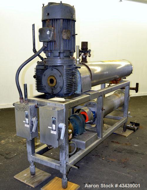 Used Cherry Burrell Votator Scraped Surface Heat Exchanger, 9 Square Feet, 304 Stainless Steel. (1) 6” Diameter x 72” long jacketed horizontal chamber with plastic wipers, and cored shaft. Internal r...