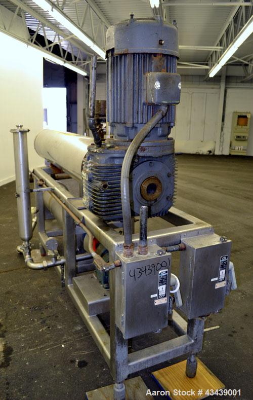 Used Cherry Burrell Votator Scraped Surface Heat Exchanger, 9 Square Feet, 304 Stainless Steel. (1) 6” Diameter x 72” long jacketed horizontal chamber with plastic wipers, and cored shaft. Internal r...