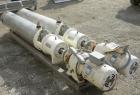Used: Cherry Burrell Votator scraped surface heat exchanger, model 6SSHE, 9 square feet per exchanger, 18 square feet total, 316 stainless steel heads, 304 stainless steel shell.  (2) 6