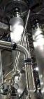 Used Alfa Laval Contherm, Model 6x9, 9 square feet surface area.  6' diameter x 9' long.  Stainless steel. Product chamber MAWP: 300 psi @ 600 degrees F. Jacket MAWP: 250 psi @ 600 degrees F. Vertica...