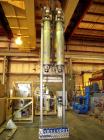 Used APV Vertical Scraped Surface Heat Exchanger System, 316 stainless steel. Consisting of: (2) APV scraped surface heat exchangers, model V884WWNN, 14.5 square feet heating surface per tube, 29 tot...