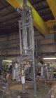 Used APV Vertical Scraped Surface Heat Exchanger System, 316 stainless steel. Consisting of: (2) APV scraped surface heat exchangers, model V884WWNN, 14.5 square feet heating surface per tube, 29 tot...