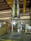 Used APV Vertical Scraped Surface Heat Exchanger System, 316 stainless steel. Consisting of: (2) APV scraped surface heat exchangers, model V884WWNN, 14.5 square feet heating surface per tube, 29 tot...
