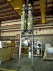 Used APV Vertical Scraped Surface Heat Exchanger System, 316 stainless steel. Consisting of: (2) APV scraped surface heat exchangers, model V884WWNN, 14.5 square feet heating surface per tube, 29 tot...