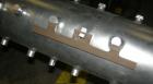 Used APV Vertical Scraped Surface Heat Exchanger System, 316 stainless steel. Consisting of: (2) APV scraped surface heat exchangers, model V884WWNN, 14.5 square feet heating surface per tube, 29 tot...