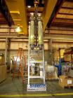 Used APV Vertical Scraped Surface Heat Exchanger System, 316 stainless steel. Consisting of: (2) APV scraped surface heat exchangers, model V884WWNN, 14.5 square feet heating surface per tube, 29 tot...