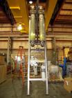 Used APV Vertical Scraped Surface Heat Exchanger System, 316 stainless steel. Consisting of: (2) APV scraped surface heat exchangers, model V884WWNN, 14.5 square feet heating surface per tube, 29 tot...