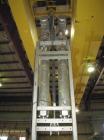 Used APV Vertical Scraped Surface Heat Exchanger System, 316 stainless steel. Consisting of: (2) APV scraped surface heat exchangers, model V884WWNN, 14.5 square feet heating surface per tube, 29 tot...