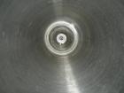 Used APV Vertical Scraped Surface Heat Exchanger System, 316 stainless steel. Consisting of: (2) APV scraped surface heat exchangers, model V884WWNN, 14.5 square feet heating surface per tube, 29 tot...