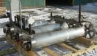 Used Alfa Laval Contherm Vertical Scraped Surface Heat Exchanger System, 27 total square feet, 316 stainless steel. Consisting of: (3) Alfa Laval scraped surface heat exchangers, model 6X9. 9 square ...