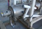 Used Chemetron Votator Scraped Surface Heat Exchanger, 12 total square feet, 304 stainless steel. (2) Approximately 6'' diameter x 48'' long horizontal chambers, plastic type scrapers, carbon steel j...