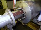 Used Chemetron Votator Scraped Surface Heat Exchanger, 12 total square feet, 304 stainless steel. (2) Approximately 6'' diameter x 48'' long horizontal chambers, plastic type scrapers, carbon steel j...