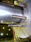 Used Chemetron Votator Scraped Surface Heat Exchanger, 12 total square feet, 304 stainless steel. (2) Approximately 6'' diameter x 48'' long horizontal chambers, plastic type scrapers, carbon steel j...
