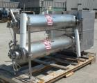 Used Cherry Burrell Thermutator Scraped Surface Heat Exchanger, Model 672L, 316 stainless steel. Approximately 18 square feet ( 9 square feet per tube). (2) 6
