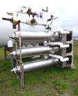 Used Cherry-Burrell Triple Tube Thermutator, 27 Total Square Feet, Stainless Steel. Consists of: (3) model 672 Thermutators, approximate 6