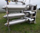 Used Cherry-Burrell Triple Tube Thermutator, 27 Total Square Feet, Stainless Steel. Consists of: (3) model 672 Thermutators, approximate 6