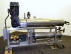 Used Cherry Burrell Votator Scraped Surface Heat Exchanger, 9 Square Feet, 304 Stainless Steel. (1) 6” Diameter x 72” long jacketed horizontal chamber with plastic wipers, and cored shaft. Internal r...