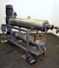 Used Cherry Burrell Votator Scraped Surface Heat Exchanger, 9 Square Feet, 304 Stainless Steel. (1) 6” Diameter x 72” long jacketed horizontal chamber with plastic wipers, and cored shaft. Internal r...