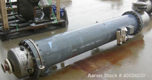 Used: Atlas shell and tube heat exchanger, approx 234 square feet, vertical. Carbon steel shell rated 100 psi at 300 deg.f.,(163) 3/4" diameter x 7'6" long hastelloy C-22 tubes rated F.V. and 100 psi...