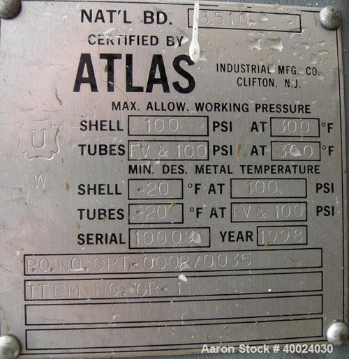 Used: Atlas shell and tube heat exchanger, approx 234 square feet, vertical. Carbon steel shell rated 100 psi at 300 deg.f.,(163) 3/4" diameter x 7'6" long hastelloy C-22 tubes rated F.V. and 100 psi...