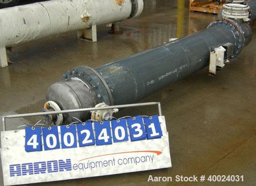 Used: Atlas shell and tube heat exchanger, approx 234 square feet, vertical. Carbon steel shell rated 100 psi at 300 deg.f.,(163) 3/4" diameter x 7'6" long hastelloy C-22 tubes rated F.V. and 100 psi...