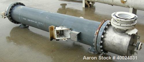 Used: Atlas shell and tube heat exchanger, approx 234 square feet, vertical. Carbon steel shell rated 100 psi at 300 deg.f.,(163) 3/4" diameter x 7'6" long hastelloy C-22 tubes rated F.V. and 100 psi...
