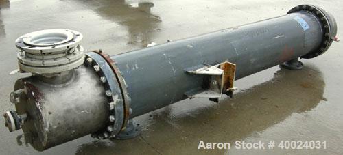 Used: Atlas shell and tube heat exchanger, approx 234 square feet, vertical. Carbon steel shell rated 100 psi at 300 deg.f.,(163) 3/4" diameter x 7'6" long hastelloy C-22 tubes rated F.V. and 100 psi...