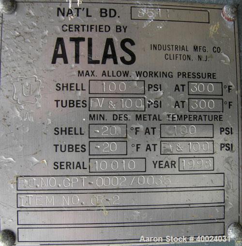 Used: Atlas shell and tube heat exchanger, approx 234 square feet, vertical. Carbon steel shell rated 100 psi at 300 deg.f.,(163) 3/4" diameter x 7'6" long hastelloy C-22 tubes rated F.V. and 100 psi...
