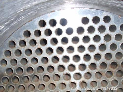 Used API Ketema Shell and Tube Heat Exchanger, 332 square feet, horizontal, type 1-V-1 BEM, size 15-A-72. Carbon steel shell rated 150 psi at –20 to 350 deg F. (615) 5/8'' diameter x 6’ long Hastello...