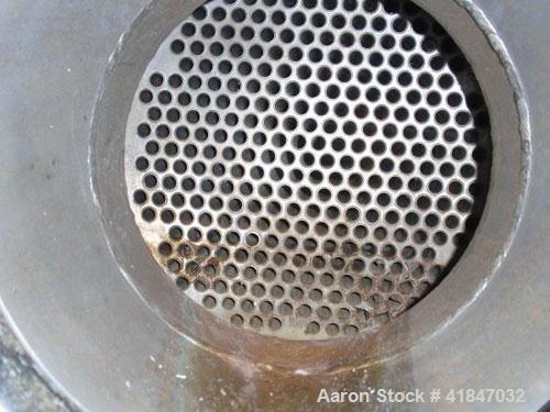 Used API Ketema Shell and Tube Heat Exchanger, 332 square feet, horizontal, type 1-V-1 BEM, size 15-A-72. Carbon steel shell rated 150 psi at –20 to 350 deg F. (615) 5/8'' diameter x 6’ long Hastello...