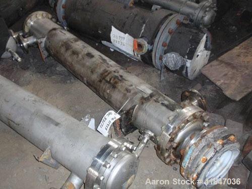 Used Allegheny Bradford Shell and Tube Heat Exchanger, 128 square feet, vertical. 304L Stainless steel shell rated 150 psi at –20 to 350 deg F. (109) 3/4" diameter x 6’ long Hastelloy C-276 tubes rat...