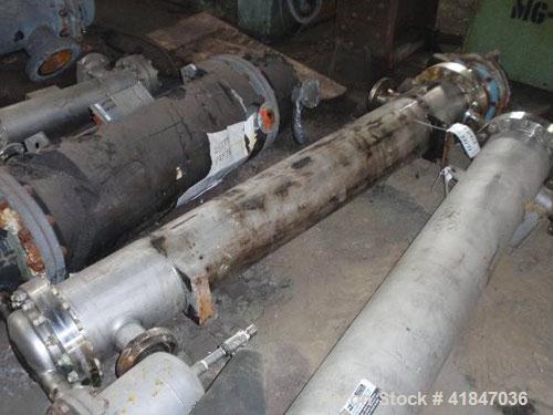 Used Allegheny Bradford Shell and Tube Heat Exchanger, 128 square feet, vertical. 304L Stainless steel shell rated 150 psi at –20 to 350 deg F. (109) 3/4" diameter x 6’ long Hastelloy C-276 tubes rat...