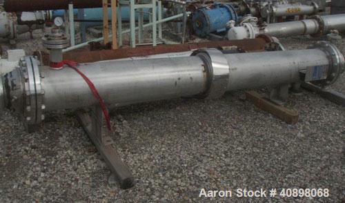 Used AstroCosmo Shell and Tube Heat Exchanger, 150 square feet , horizontal.Tantalum tubes, tube sheets and bonnets with (80) 3/4" diameter x 9' 6" long tubes rated 150 psi and full vacuum at 350 deg...